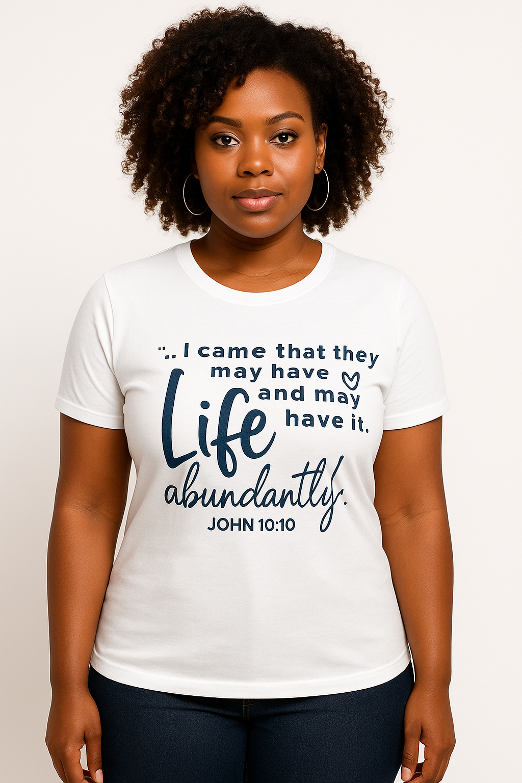 Person wearing a white t-shirt with a motivational quote. John 10:10